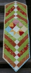 Holly Jolly Funtabulous Star Quick Table Runner from BOMquilts.com