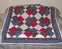 “Card Trick Baby Quilt” Free Charity Quilt Pattern designed by Bobbi Janik from Project Linus brought to you by BOMquilts.com