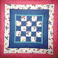 “Easy Preemie Quilt” Free Charity Quilt Pattern designed by the Fraser Valley Quilters Guild, Surrey, British Columbia from Project Linus brought to you by BOMquilts.com