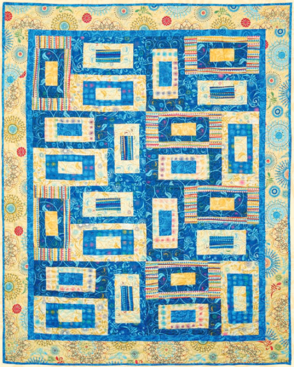 “Geometric Squares” a Free Picnic Quilt Pattern designed by Michell Scott from the AQS Blog