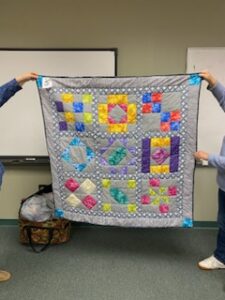 "Happiness is Quilting" a 2017 BOM quilt made by Dorothy M. from the El Campo Casual Quilt Guild. It's an original quilt design by TK Harrison from BOMquilts.com!