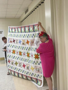 Audry S. sewed my "Windowsill Wonders" 2018 Row of the Month quilt together! She's with the Holmes Valley Quilters from Holmes County, Florida!