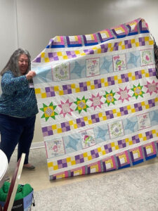 Diane sewed my "Windowsill Wonders" 2018 Row of the Month quilt together! She's with the Holmes Valley Quilters from Holmes County, Florida!