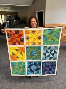 "Happiness is Quilting" 2017 BOM quilt is an original design by TK Harrison. Made by Evelyn H. with the Quilting Ministry of Manahawkin Baptist Church!