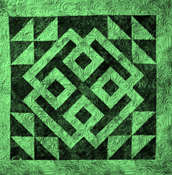 "Modern Celtic" is a Free St. Patrick's Day Quilt Pattern designed by Tricia Lynn Maloney of the Man Cave from Quilter's World!
