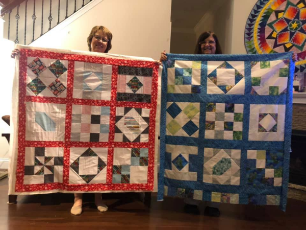 "Happiness is Quilting" 2017 BOM quilt is an original design by TK Harrison. Made by a member of the Piecemakers Quilt Guild!