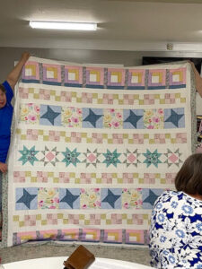 Vickie sewed my "Windowsill Wonders" 2018 Row of the Month quilt together! She's with the Holmes Valley Quilters from Holmes County, Florida!
