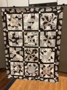 Gloria H. sewed my original design "Cinnamon-teen Chocolate Figs & Roses" BOM quilt together!