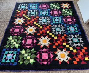 Barb S. sewed my 2022 "Majestic Beauty" BOM quilt together! It's an Original Design by TK Harrison for BOMquilts.com!