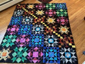 Chantal H. sewed my 2022 "Majestic Beauty" BOM quilt together! It's an Original Design by TK Harrison for BOMquilts.com!