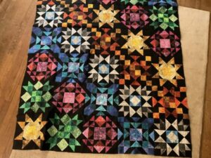 Kathy L. sewed my 2022 "Majestic Beauty" BOM quilt together! It's an Original Design by TK Harrison for BOMquilts.com!