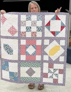 Barbara M. Sewed my 2017"Happiness is Quilting" BOM quilt together! She's part of the "Disconnected Piecers Quilt Guild! Free pattern is from BOMquilts.com & is designed by TK Harrison!