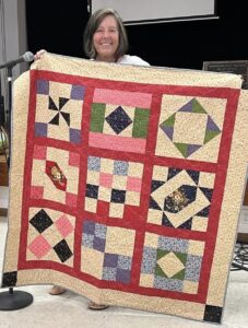 Pat B. Sewed my 2017"Happiness is Quilting" BOM quilt together! She's part of the "Disconnected Piecers Quilt Guild! Free pattern is from BOMquilts.com & is designed by TK Harrison!