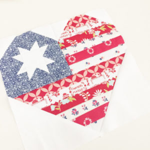 "I Heart America" is a Free Patriotic Quilt Block Pattern designed by Cristina Tepsick from Pretty Little Quilts!
