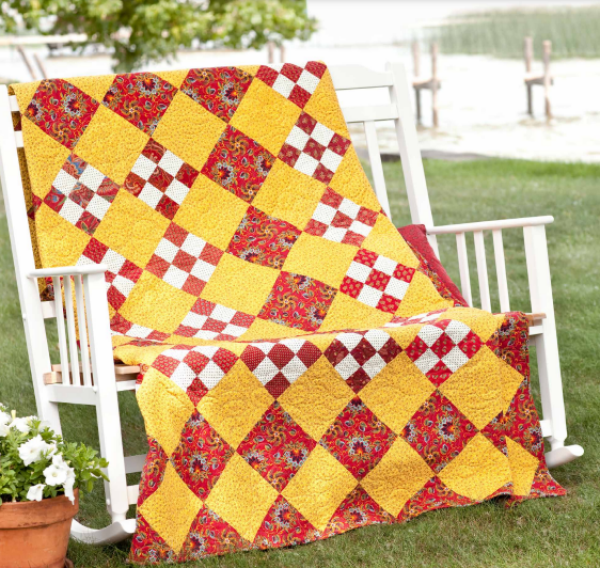 “Summer Salsa” is a Free Nine-Patch Quilt Pattern designed by Kathie Holland from American Patchwork & Quilting!