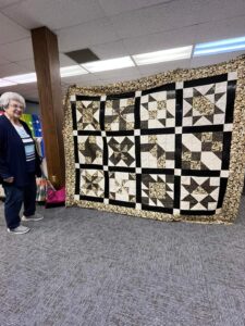 "Cinnamon-teen Chocolate Figs & Roses" BOM quilt sewn together by Judy of the Central Kansas ThreadBenders Quilt Guild! This quilt was designed exclusively for BOMquilts.com!