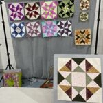 One set of "Quilted Kitchen Sampler" BOM quilt blocks made by a member of the Huntington Quilt Guild! The "Quilted Kitchen Sampler" BOM quilt was designed by TK Harrison, owner of BOMquilts.com!