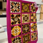 One "Quilted Kitchen Sampler" BOM quilt made by a member of the Huntington Quilt Guild! The "Quilted Kitchen Sampler" BOM quilt was designed by TK Harrison, owner of BOMquilts.com!