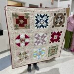 One "Quilted Kitchen Sampler" BOM quilt made by a member of the Huntington Quilt Guild! The "Quilted Kitchen Sampler" BOM quilt was designed by TK Harrison, owner of BOMquilts.com!
