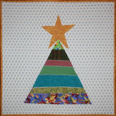 Christmas in July 2011 - Scrappy String Christmas Tree Table Topper designed by BOMquilts.com