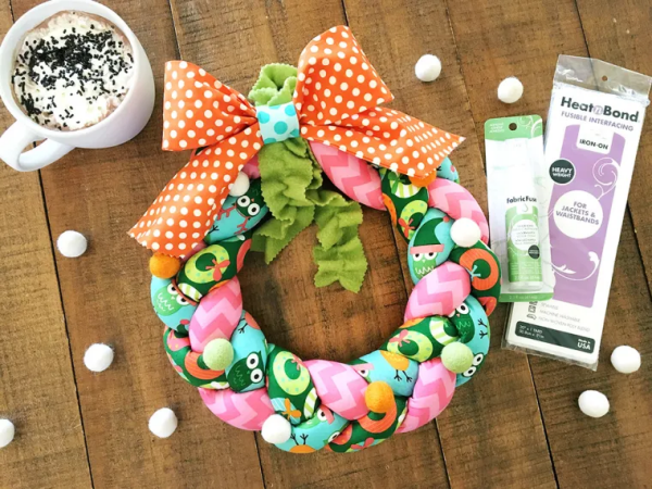 “Braided Fabric Christmas Wreath” is a Free Quilted or Sewn Christmas Project designed by Tamara Tripodi from Therm-O-Web Blog