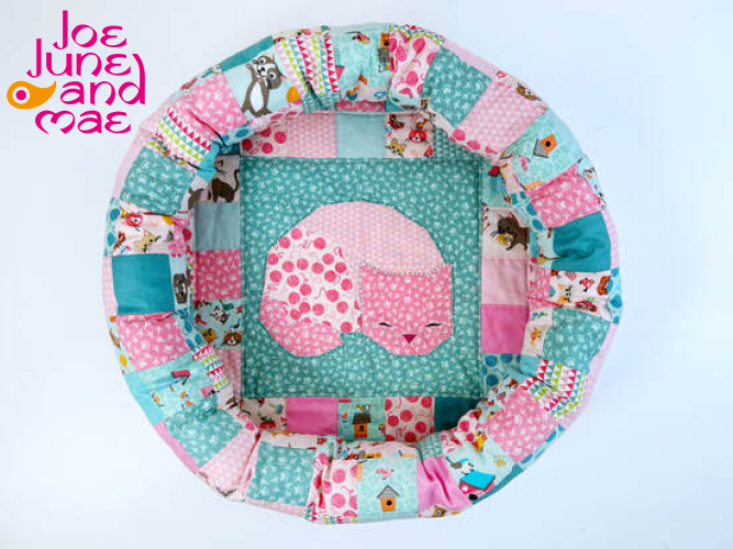 "Prettiest Quilted Cat Bed" is a Free Quilted Pet Bed Pattern designed by Ingrid Alteneder from Joe June and Mae!