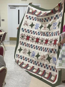 Linda L. sewed my "Windowsill Wonders" 2018 Row of the Month quilt together! She's with the Holmes Valley Quilters from Holmes County, Florida!