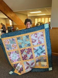 "Happiness is Quilting" 2017 BOM quilt is an original design by TK Harrison. Made by Maria R. with the Quilting Ministry of Manahawkin Baptist Church!