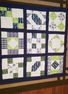 "Happiness is Quilting" 2017 BOM quilt is an original design by TK Harrison. Made by a member of the Piecemakers Quilt Guild!