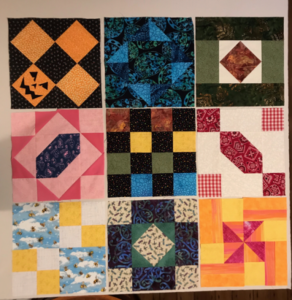 "Happiness is Quilting" 2017 BOM quilt is an original design by TK Harrison. Made by a member of the Piecemakers Quilt Guild!