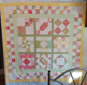 "Happiness is Quilting" 2017 BOM quilt is an original design by TK Harrison. Made by a member of the Piecemakers Quilt Guild!