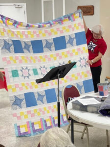 Sue C. sewed my "Windowsill Wonders" 2018 Row of the Month quilt together! She's with the Holmes Valley Quilters from Holmes County, Florida!
