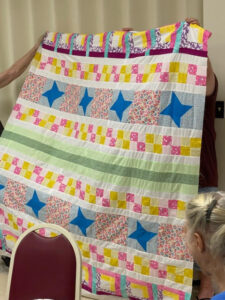 Vickie R. sewed my "Windowsill Wonders" 2018 Row of the Month quilt together! She's with the Holmes Valley Quilters from Holmes County, Florida!