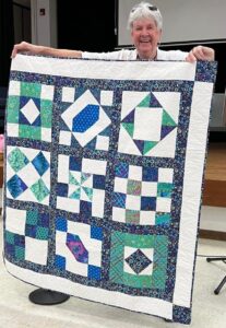 Karen M. Sewed my 2017"Happiness is Quilting" BOM quilt together! She's part of the "Disconnected Piecers Quilt Guild! Free pattern is from BOMquilts.com & is designed by TK Harrison!