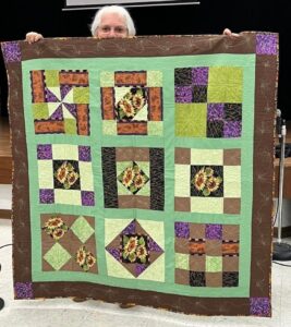 Kathy P. Sewed my 2017"Happiness is Quilting" BOM quilt together! She's part of the "Disconnected Piecers Quilt Guild! Free pattern is from BOMquilts.com & is designed by TK Harrison!