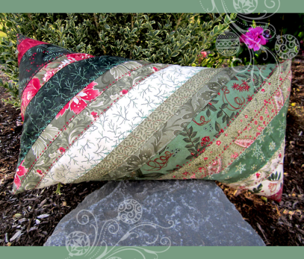 "Patchwork Strip Pillow with Decorative Stitching" is a Free Jelly Roll Quilted Pillow Pattern designed by Alicia Thomas from Sew 4 Home!
