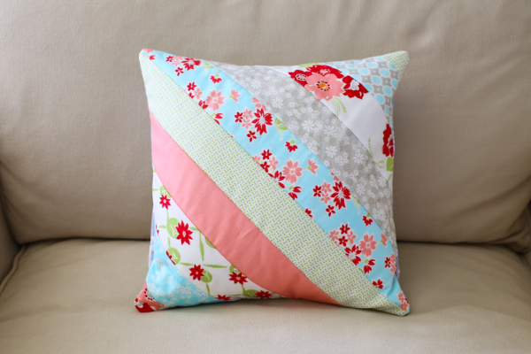 "Striped Pillow Case" is a Free Jelly Roll Quilted Pillow Pattern designed by Susie from Loganberry Handmade!
