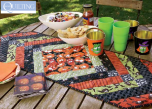 "Monster Munchies” is a Free Halloween Quilted Table Runner Pattern designed by Jean Anne Sharrai and Gayle Noyes from McCall's Quilting!
