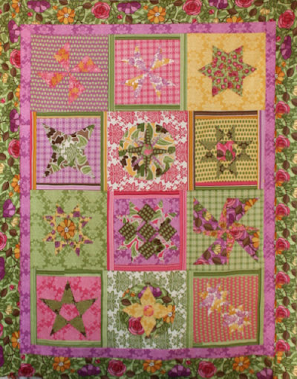 Santorini Stars is a 2010 Block of the Month (BOM) Quilt originally designed by TK Harrison, owner of BOMquilts.com!