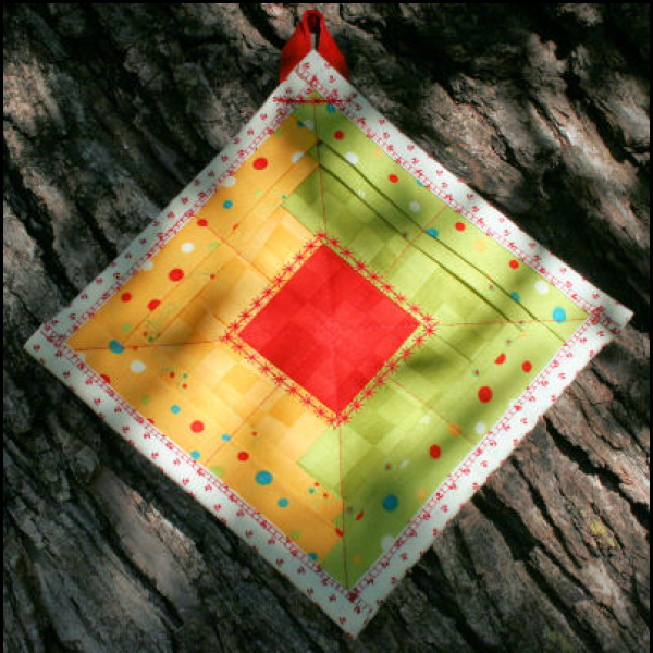 Holly Jolly Potholder designed by TK Harrison, Owner of BOMquilts.com!