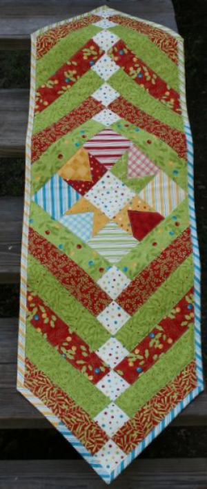 Holly Jolly Funtabulous Table Runner designed by TK Harrison, Owner of BOMquilts.com!