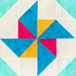 Block #8—Double Windmill Quilt Block—of the 2025 "Canyon Adventures" BOM quilt designed by TK Harrison the Owner of BOMquilts.com! Made by my Tester Mirian!