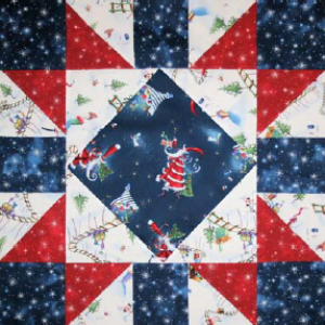 Merriment Star Table Topper designed by TK Harrison for BOMquilts.com!