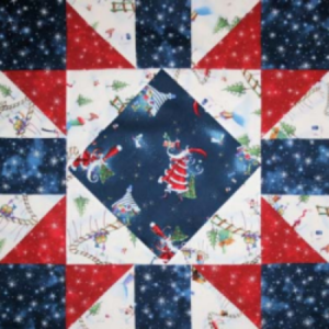 Merriment Star Table Topper—an Original Design by TK Harrison for BOMquilts.com!